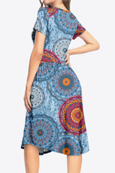 Robe imprimée à col rond et manches courtes avec poches
